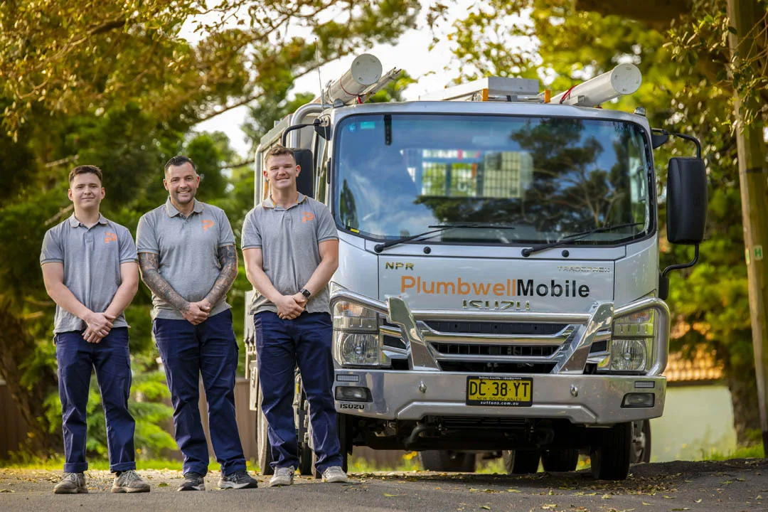 The local drain crew with their service truck